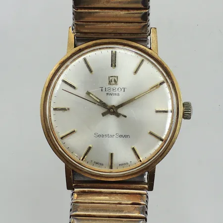 Herrur Tissot, Seastar Seven, Ø34mm, manuell, boett i 18K, flexiband i stål, repig, gravyr, inga tillbehör.  Vikt: 0 g