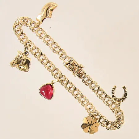 Armband Bismarck med 5st berlocker, längd 18,5cm, bredd 5mm, 18K  Vikt: 13,9 g