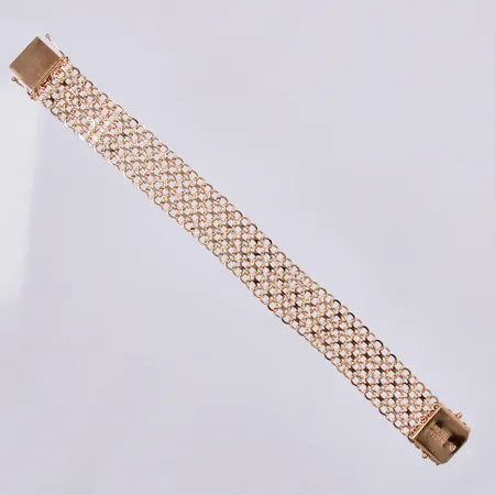 Armband X-länk, N S E Guldvaru Aktiebolag 1967, längd ca 18,5cm, bredd ca 18mm, något bucklig länk, 18K Vikt: 27,9 g