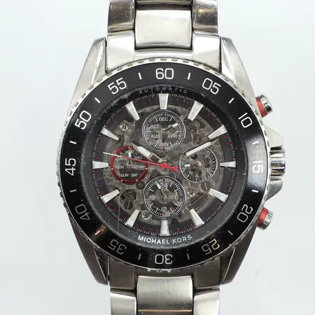 Armbandsur Michael Kors Jetmaster, Ø46mm, automatisk, Dag/datum/månad, Ref MK-9011, srn: 111511, stål, glasbaksida, repig länk, repor på glas, inga övriga tillbehör
