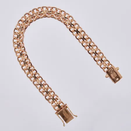 Armband X-länk, längd: ca 19cm, bredd: ca 10mm, VLA, Västerguld Ahlstrand, Stockholm, år 1976, 18K  Vikt: 26,1 g