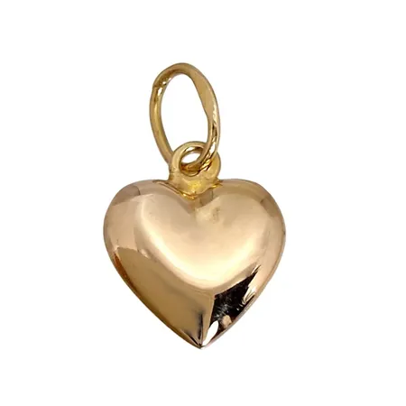 Hänge Hjärta, 18K guld, slät modell, längd inkl. ögla 12 mm, bredd 7 mm, tjocklek 2 mm, fint skick Vikt: 0,2 g
