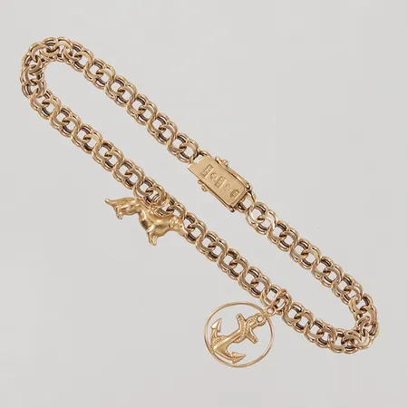 Armband Bismarck, ca 20cm, bredd 5,1mm, 2 berlocker, kistlås, BGS 18K Vikt: 11,1 g