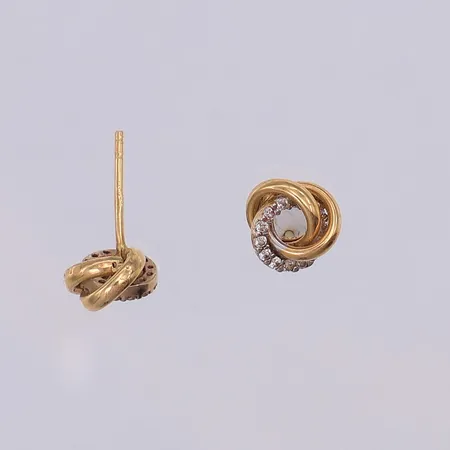 Ett par örhängen, vita stenar, 7mm, saknar stoppar, 18K Vikt: 1 g