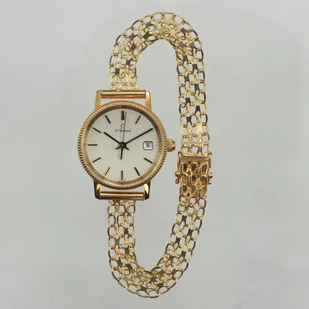 Damur Eterna, Ø24mm, quartz, datum, boettnummer: 4704.68, boett samt länk i 18K, går ej, gravyr, 18K, bruttovikt:18,8g. 
