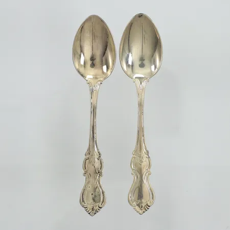 Två mockaskedar, modell Olga, längd 10,9cm, silver  Vikt: 30,8 g