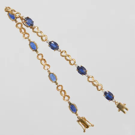 Armband med kyanit samt diamanter 16 x ca.0,007ct, längd: 19,5cm, bredd: 4-5mm, 9K Vikt: 8,7 g
