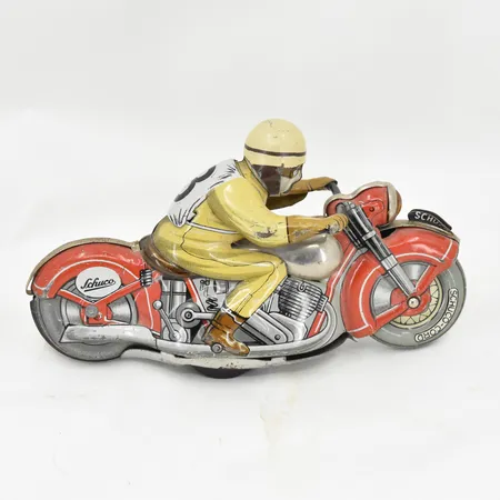Leksak, Motorcykel, Schuco Moto Drill 1006 "sport" tillverkad ca 1940-1950 tal, plåt, färgbortfall, made in U.S-zone Germany, saknar uppdragningsnyckel, inga tillbehör.