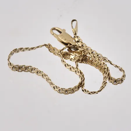 Defekt guld, 18K, vikt 2,86g.