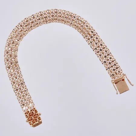 Armband X-länk med stav, längd: ca 19cm, bredd: ca 10mm, NSE, N S E Guldvaru Aktiebolag, Köping, år 1991, 18K  Vikt: 13,3 g