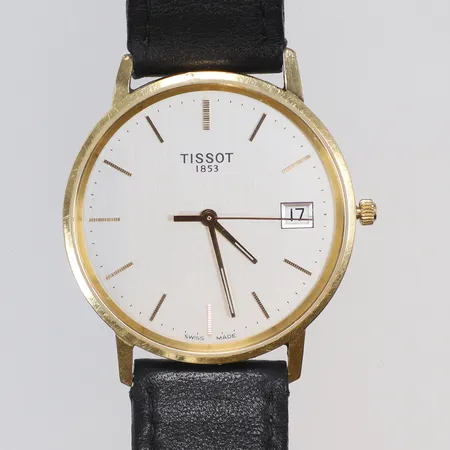 Herrur Tissot, 18K i boett, quartz, datum, Ø36mm, läderband, gravyr, i originalkartong, bruttovikt 28,5g