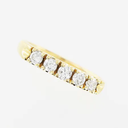 Ring, 5st diamanter 0,50ctv enligt gravyr, guldfynd, stl 17½, bredd 2,5-3,5mm, 18K Vikt: 3,8 g