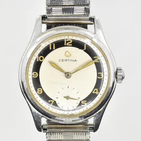 Herrur Certina, boett Ø34 mm, manuell, stål, refnr 6001 002, flexband, tvåfärgad urtavla, ca 1950-tal, fungerade vid testtillfället, inga tillbehör.