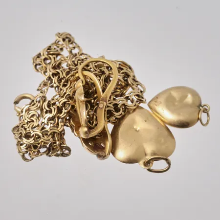 Diverse defekt guld, 18K, vikt 11,57g.