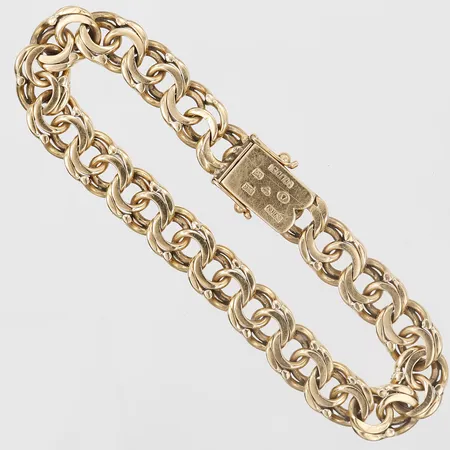 Armband, Bismarck, längd: 19, bredd: 9 mm, trögt lås, 18K guld. Vikt: 28,4 g