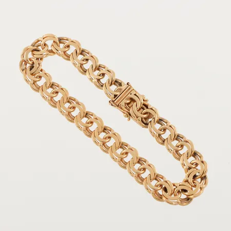 Armband Bismarck, längd ca 18.5 cm, bredd 8.8 mm, 18k. Vikt: 28,1 g