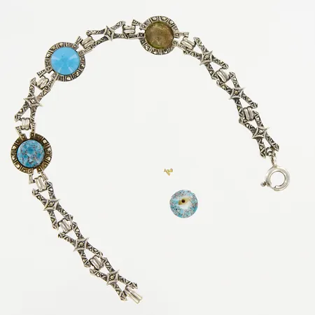 Armband med turkosa stenar samt markasiter, 20cm, bredd 13mm, defekt, en lös sten, silver 830/1000, bruttovikt 14,3 gram Vikt: 0 g