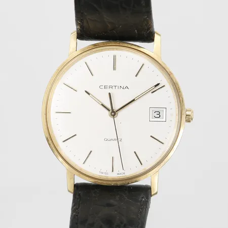 Herrur Certina 18K, boett Ø33,5 mm, quartz, datum, EOL 115.9299.68, graverad bakboett, läderband, box med fläckar. Bruttovikt. 29,1g Vikt: 0 g