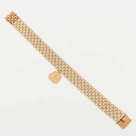 Armband X-länk, längd ca 18.5 cm, bredd 14.5 mm, 18k. Vikt: 25,1 g