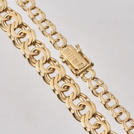 Collier i 18K guld, 46,5cm, Bismarck, docerat, bredd 6,1x10mm, vikt 38,93g.