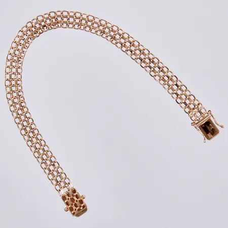 Armband X-länk, längd ca 18,5cm, bredd ca 8mm, TC Clareus 1978, 18K Vikt: 8,2 g