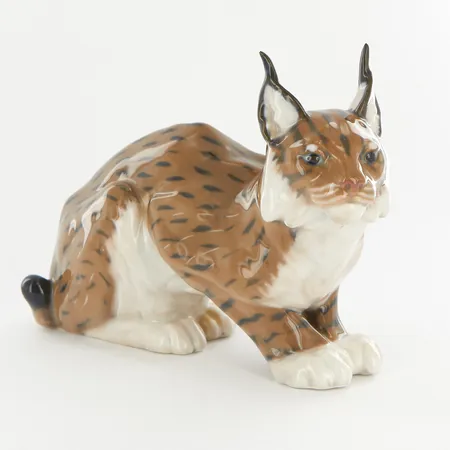 Figurin Royal Copenhagen, Lodjur, nr 1329, Höjd 12 cm, Längd 15 cm, Danmark  Vikt: 0 g