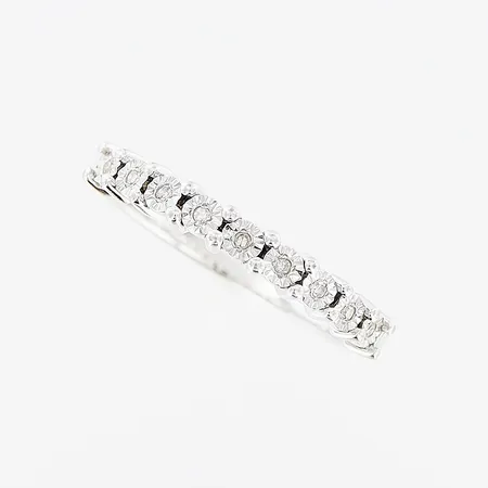 Ring, diamanter 9 x ca 0,005ct, stl 15½, bredd 1,5-2,5mm, GHA, vitguld, 18K Vikt: 2,2 g
