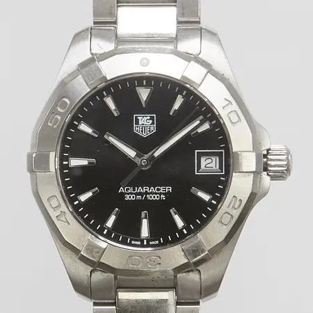 Damur Tag Heuer Aquaracer, stål, quartz, 32,5mm, ref: WAY1310, snr: RHT2698, safirglas, datum, stållänk, viklås, extra länkbit, repig, box, ytterkartong, inga övriga tillbehör.