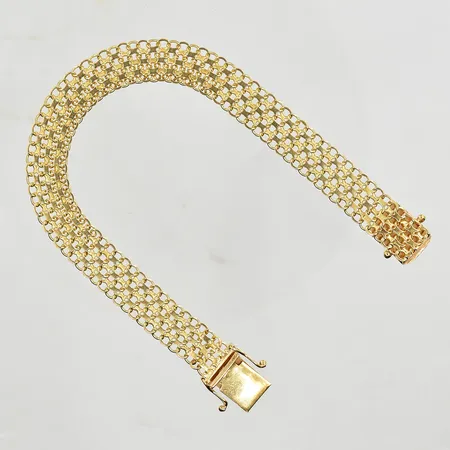 Armband X-länk, längd 19½ cm, bredd 10 mm, 18K. Vikt: 15,7 g