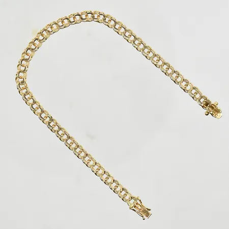 Armband Bismarck, längd 18½ cm, bredd 4 mm, något glappt lås, 18K. Vikt: 7,6 g