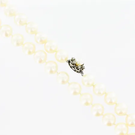 Pärlcollier 50cm, odlade sötvattenspärlor Ø9,5mm, lås i silver med vita stenar, silver 925/1000. Vikt: 0 g