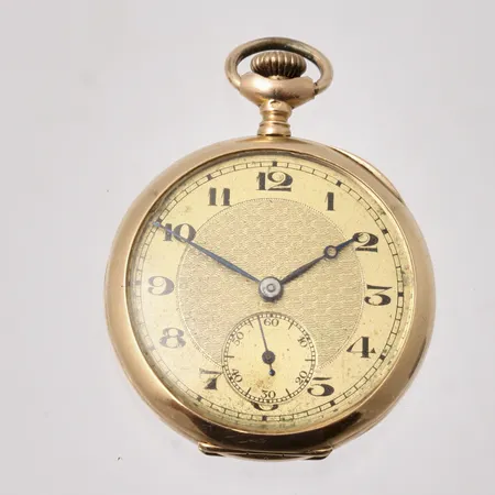 Fickur i 18K guld, Ø31,6mm, manuell, liten sekundvisare, innerboett i metall, boett-nr 57911, bruttovikt 27,83g.