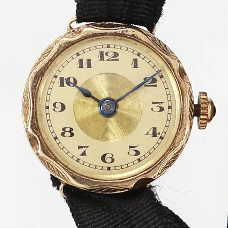 Damur 14K i boett Ø20mm, tygband, spänne i gulmetall, manuell, fungerar ej