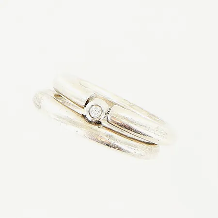 Ring Ebba Huberyc Simrishamn, två delar, stl 19, bredd 7mm, diamant ca 0,05ct, briljantslipad, silver 925/1000. Vikt: 16,9 g