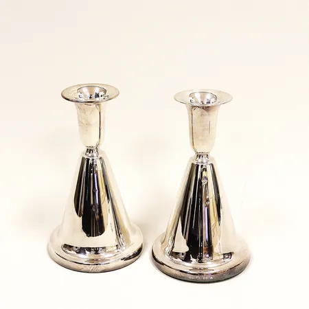 Ett par ljusstakar silver, höjd 13,5cm, fylld botten, bruttovikt 543,7g, silver 830/1000.