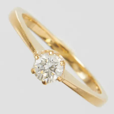 Enstensring med diamant 1 x 0,25ct enligt gravyr, ca.W(H)/SI, Ø15½, bredd: 1,6-4,3mm, GHA, ograverad, 18K Vikt: 2,4 g