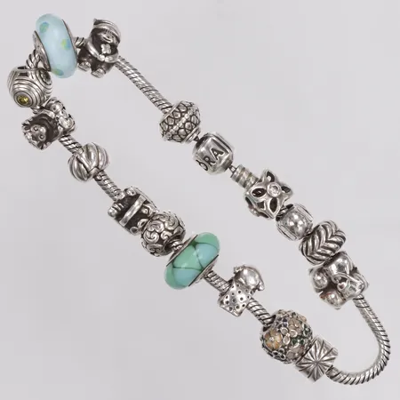 Armband, Pandora med 12 berlocker, längd 23cm, bredd 3-15mm, 925/1000 silver  Vikt: 67,9 g