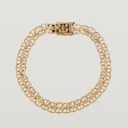 Armband X-länk med stav, ojämnheter/slitage, längd ca 16 cm, bredd 6.3 mm, 18k. Vikt: 6,7 g