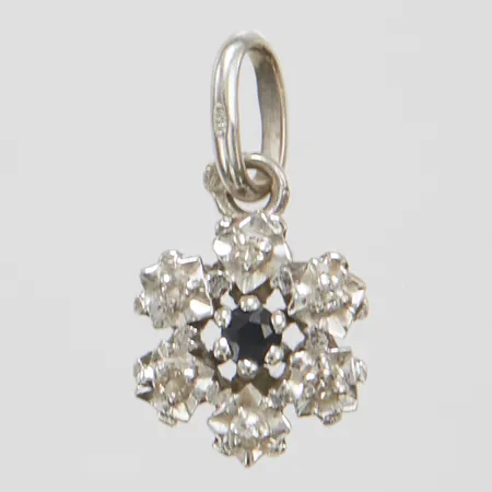 Hänge, vitguld, 16mm, snöflinga med en safir samt diamanter 6 x ca: 0.003 ct, 8/8-slipade, kattfot, 18K  Vikt: 1,3 g