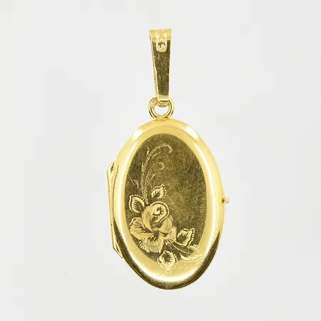 Hänge medaljong med blommotiv, längd 28 mm, bredd 13 mm, 18K. Vikt: 2,1 g