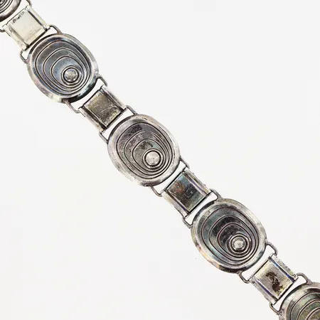 Armband 18cm, bredd 20mm, LN&Co Göteborg 1953, silver 830/1000. Vikt: 20,4 g