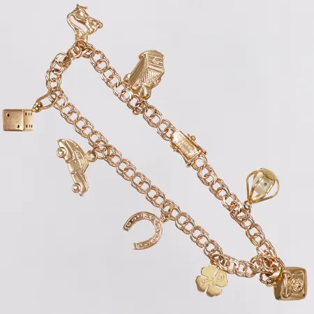 Armband, Bismarck, åtta berlocker, längd ca19,2cm, bredd 4,5-16mm, Barrbrink Guldsmed Kjell, år 1950, 18K Vikt: 10,6 g