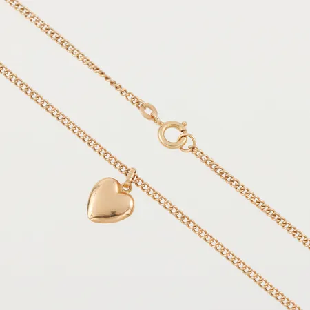 Collier med hänge, längd ca 46 cm, hängets höjd 13 mm, 18k. Vikt: 6,2 g