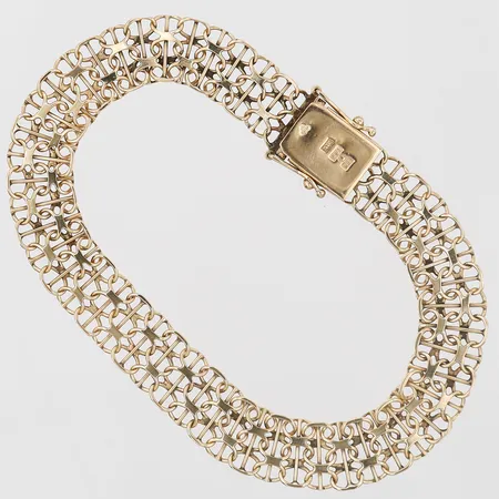 Armband, X-länk med stav, längd: 19 cm, bredd: 9,5 mm, 18K guld. Vikt: 11 g