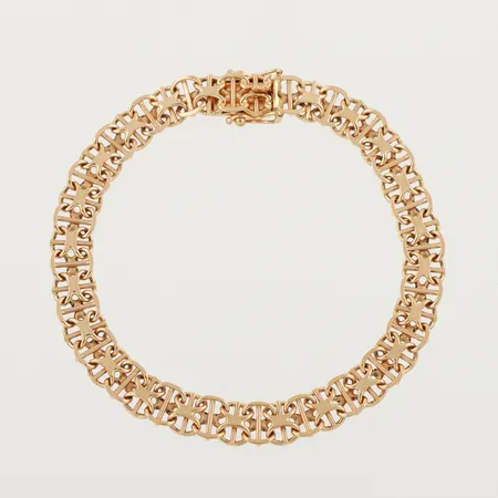 Armband X-länk med stav, längd ca 18.5 cm, bredd 7 mm, 18k. Vikt: 12,7 g