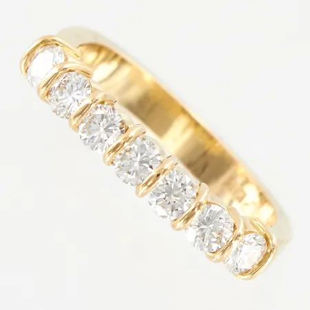 Ring med diamanter 0,72ct enligt gravyr, stl 16¾, bredd ca 3mm, 18K  Vikt: 4,2 g