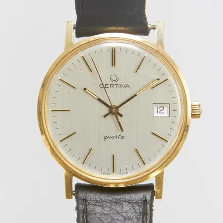Herrur Certina, 14K, quartz, 33,6mm, boettnr: 744.3810.65, repigt glas, datum, slitet läderband samt bygelspänne ej original, inga tillbehör.