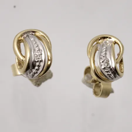 1par örhängen i 18K guld/vitguld, mått 6,2x8mm, 1st vit sten, mått Ø1mm, vikt 1,3g.
