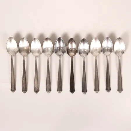 Tio moccaskedar, modell Drotten, GAB, Stockholm år 1951-1959, längd: 111 mm, silver. Vikt: 125,8 g