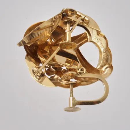 Diverse defekt guld, 18K, vikt 5,18g.